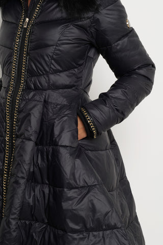 KAZUMI long-sleeved down jacket with full skirt and faux fur collar