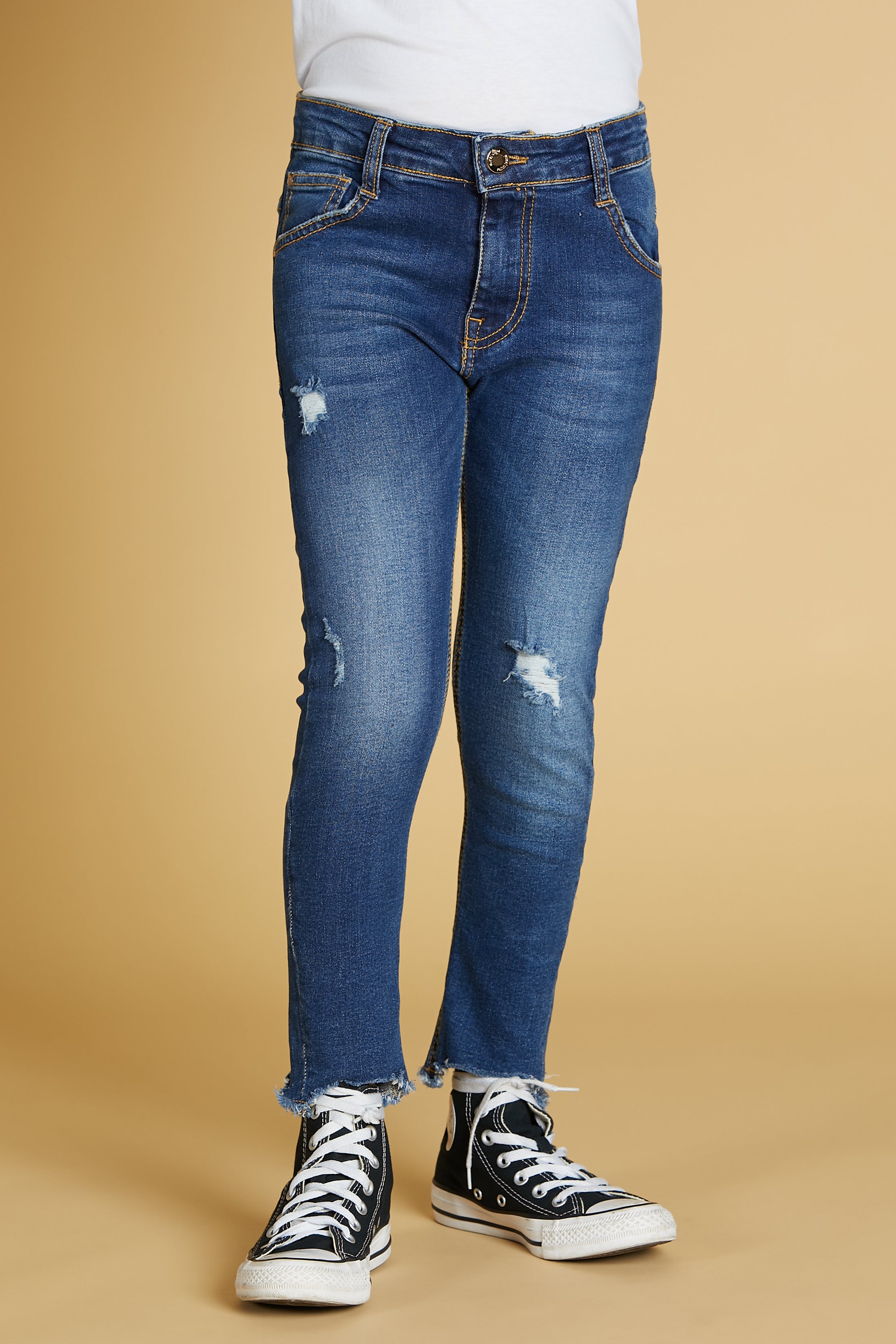 Jeans stretch effetto delavato con strappi arricchiti da toppe interne per  bambino da 6 mesi a 7 anni Sarabanda - PANTALONI - Bambino - Sarabanda